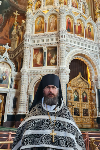 Отец Ириней